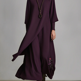 Ралица | Макси рокля в лилаво с висока яка и асиметрични плисета